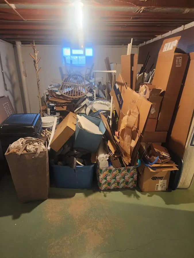 Roll-off dumpster container at job site for 2 Yard Dumpster Rental in Constantine